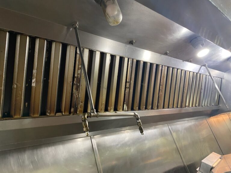 Grease Filter Exchange For Commercial Kitchens   Dirty Filters In Hood 768x576 